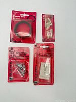 All four Bulldog picture hanging packages