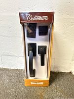 Front of packaged Tough Guard entrance gripset