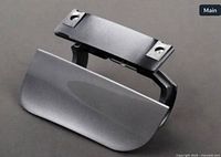 Front view of silver washer jet cover with mounting bracket