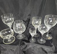 Group of assorted stemware shapes showcasing variety and labels