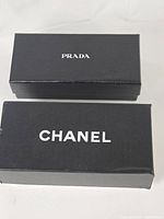 Prada and Chanel branded outer boxes