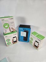 Group shot of Echo Plus box and three Belkin WeMo boxes