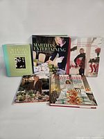Group shot of all five Martha Stewart books standing and lying flat