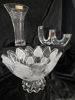 All three crystal pieces grouped together on black backdrop