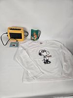 Group shot showing Snoopy shirt, Panasonic RQ-711S, Disney Hunchback player