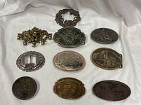 All ten pieces arranged in three rows on white cloth