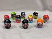 Front view of all ten Mighty Beanz standing upright