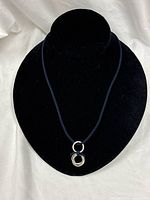 Necklace displayed on bust showing full length and pendant