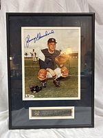 Full framed autographed photo with nameplate