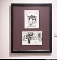 Full view of black frame with burgundy mat holding two ink drawings