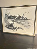 Front view showing entire framed ink drawing with coastal scene and lighthouse