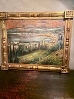 Front view of framed oil painting showing full artwork and frame