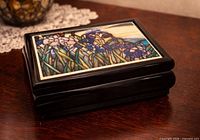 Closed box showing ceramic tile lid art