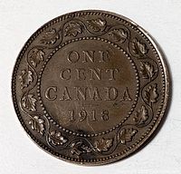 Reverse of 1918 Canada one-cent coin showing denomination within maple leaf wreath