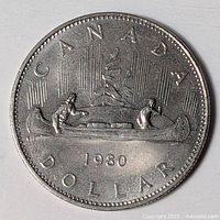 Reverse of 1980 Canadian dollar showing Voyageur design