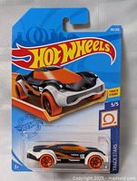 Front view of sealed Hot Wheels Cosmic Coupe package