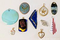 Group shot of all ten assorted pendants