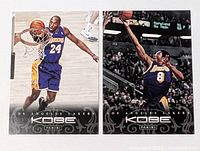 Front of both Kobe Bryant Panini cards