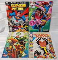 Group shot of all four comic books