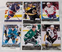 All six rookie cards laid out, full view