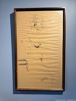 Full view of framed nude drawing