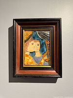 Framed ceramic relief tile front view