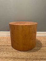 Front view of wood drum side table