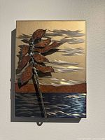 Front view of metal wall art showing full design