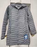 Front view of grey Columbia Omni-Heat jacket with tag