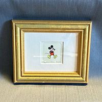 Front view of framed Mickey Mouse etching