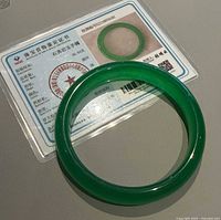 Jade bangle and certificate front side
