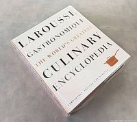 Front view of sealed Larousse Gastronomique book