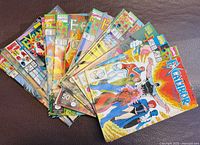 Fan-out view showing all Excalibur comics in the lot