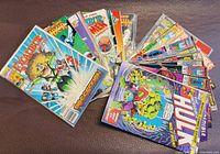 Fan display of whole lot, showing Excalibur Special Edition on top, assorted Excalibur and Hulk issues beneath