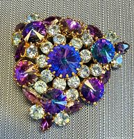 Front view of multicolour rhinestone brooch