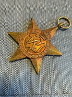 Obverse of bronze star medal with ring