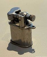 Rectangular miniature lighter standing upright