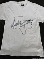 Full front view of T-shirt showing graphic and overall condition