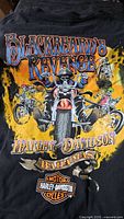 Back of T-shirt with large “Blackbeard’s Revenge” motorcycle graphic and Bahamas dealer text