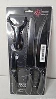 Front of retail package showing three knives and peeler, brand name visible
