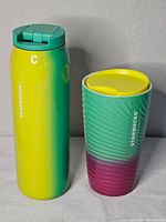 Both Starbucks tumblers side by side