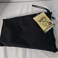 Carry bag with attached product tag visible