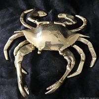 Top view of brass crab ashtray closed
