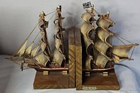 Front view of both wooden ship bookends side by side