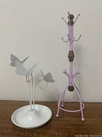 Two jewelry stands side by side