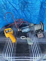 Winch with cable, remote, pulley block