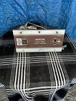 Front view of Apache Solid-State power converter showing controls and carry strap