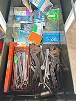 Drawer overview showing wrenches, fasteners, hardware