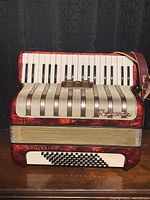 Front view showing keyboard, grille, straps attached