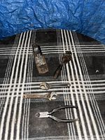 All five miniature tools arranged on surface